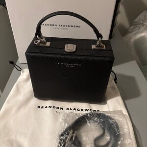 Brandon Blackwood black purse